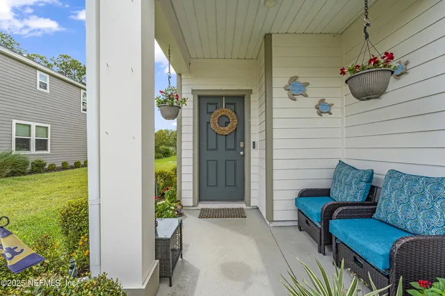 a view of a chairs in the patio