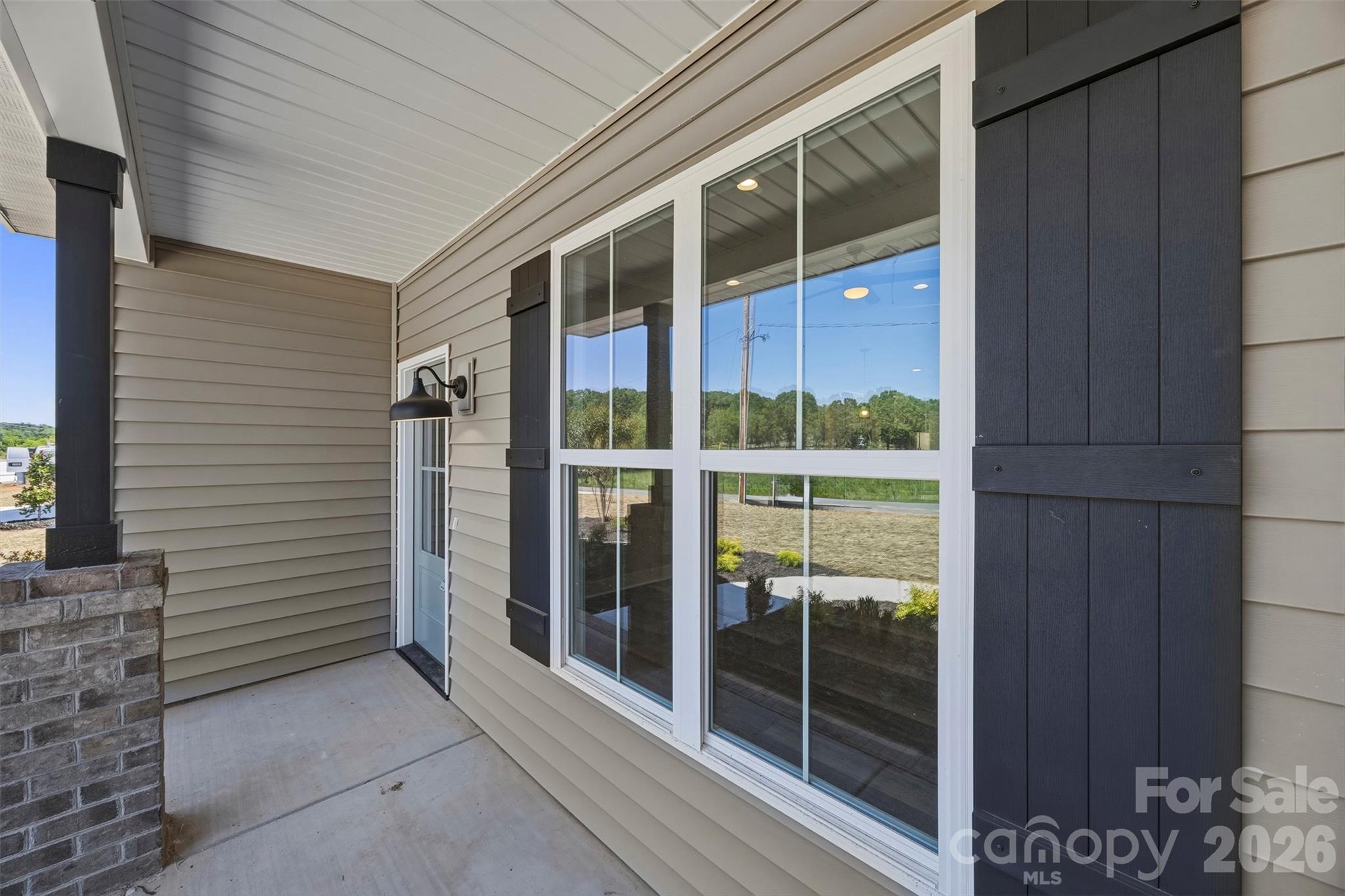 1014 Speight Road Albemarle, NC 28001 - Photo 3 of 28 a view of a building from a glass door