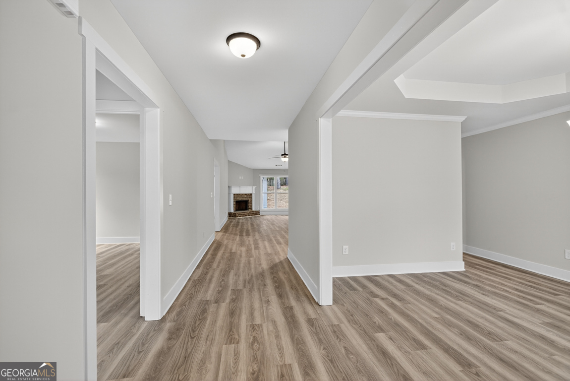 88 Mockingbird Lane, Unit 37 Winder, GA 30680 - Photo 3 of 40 a view of hallway with wooden floor