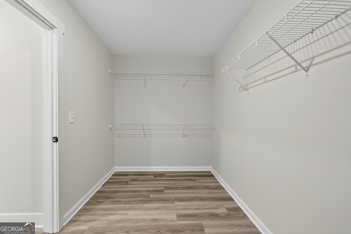 88 Mockingbird Lane, Unit 37 Winder, GA 30680 - Photo 36 of 40 a view of a room with wooden floor