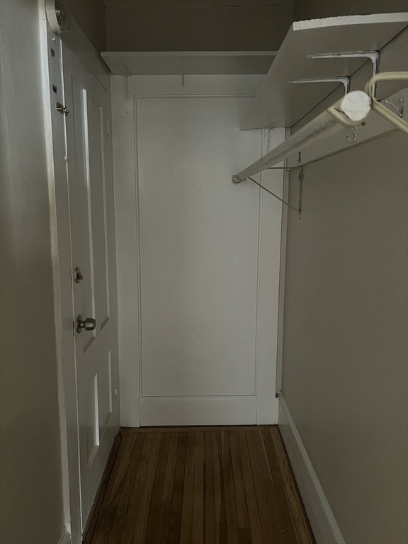 15 Harris Street, Unit 2 Marblehead, MA 01945 - Photo 13 of 19 a view of a room with wooden floor