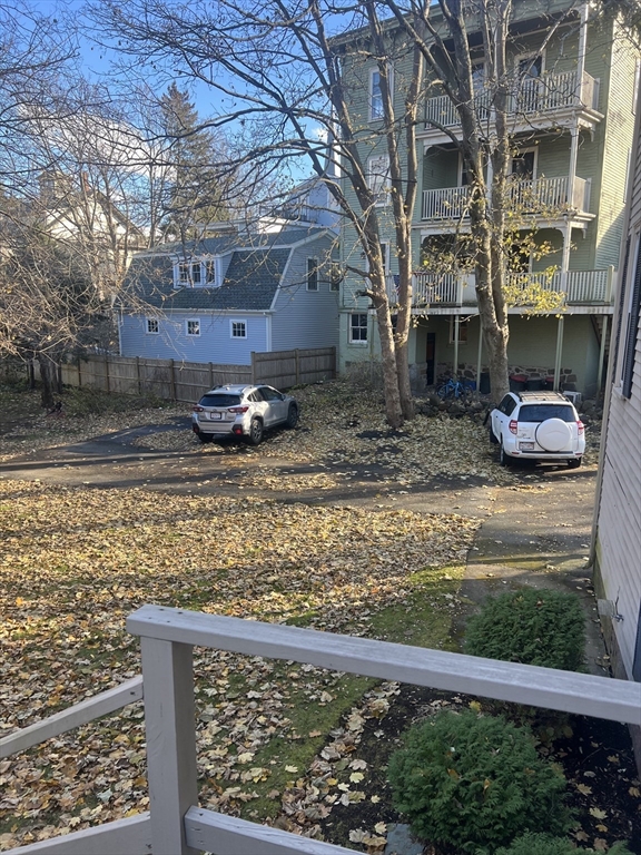 15 Harris Street, Unit 2 Marblehead, MA 01945 - Photo 16 of 19 a front view of a house with garden