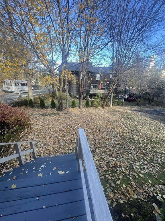 15 Harris Street, Unit 2 Marblehead, MA 01945 - Photo 17 of 19 a view of yard with wooden stairs