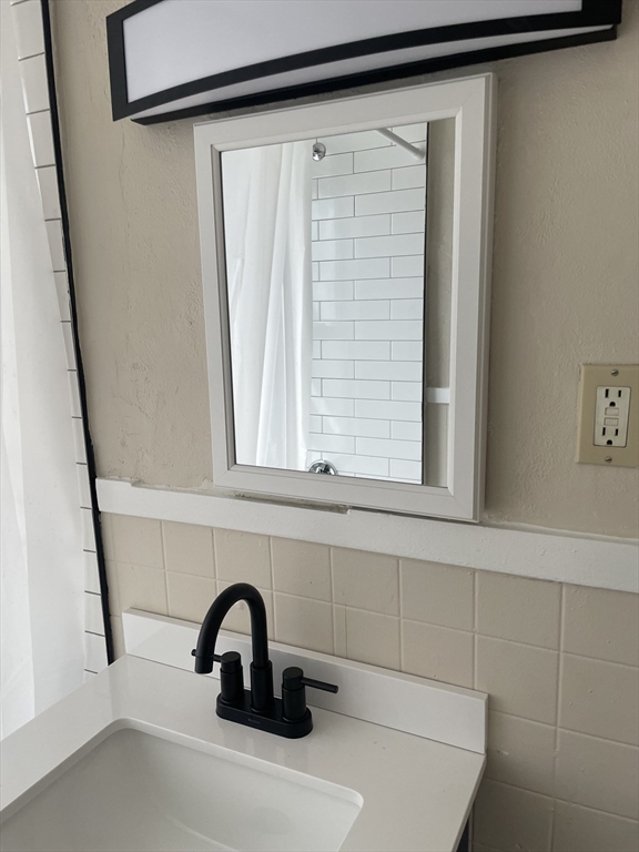 15 Harris Street, Unit 2 Marblehead, MA 01945 - Photo 8 of 19 a close view of a sink and a window