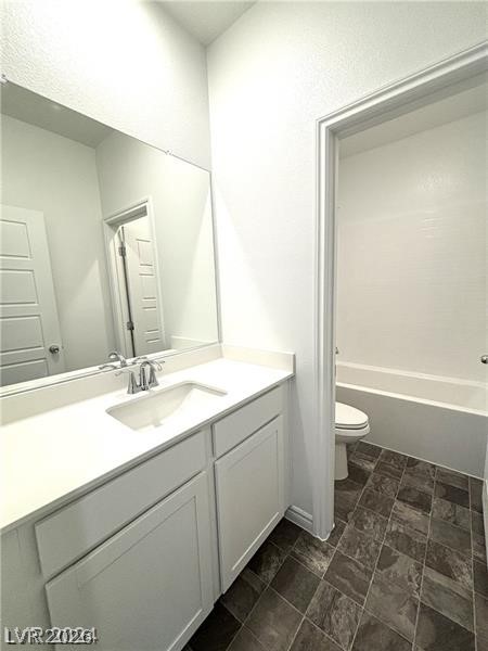 8336 Rowan Rdg Avenue Las Vegas, NV 89147 - Photo 12 of 15 This clean bathroom offers a vanity with ample counter space and a shower-tub combination.