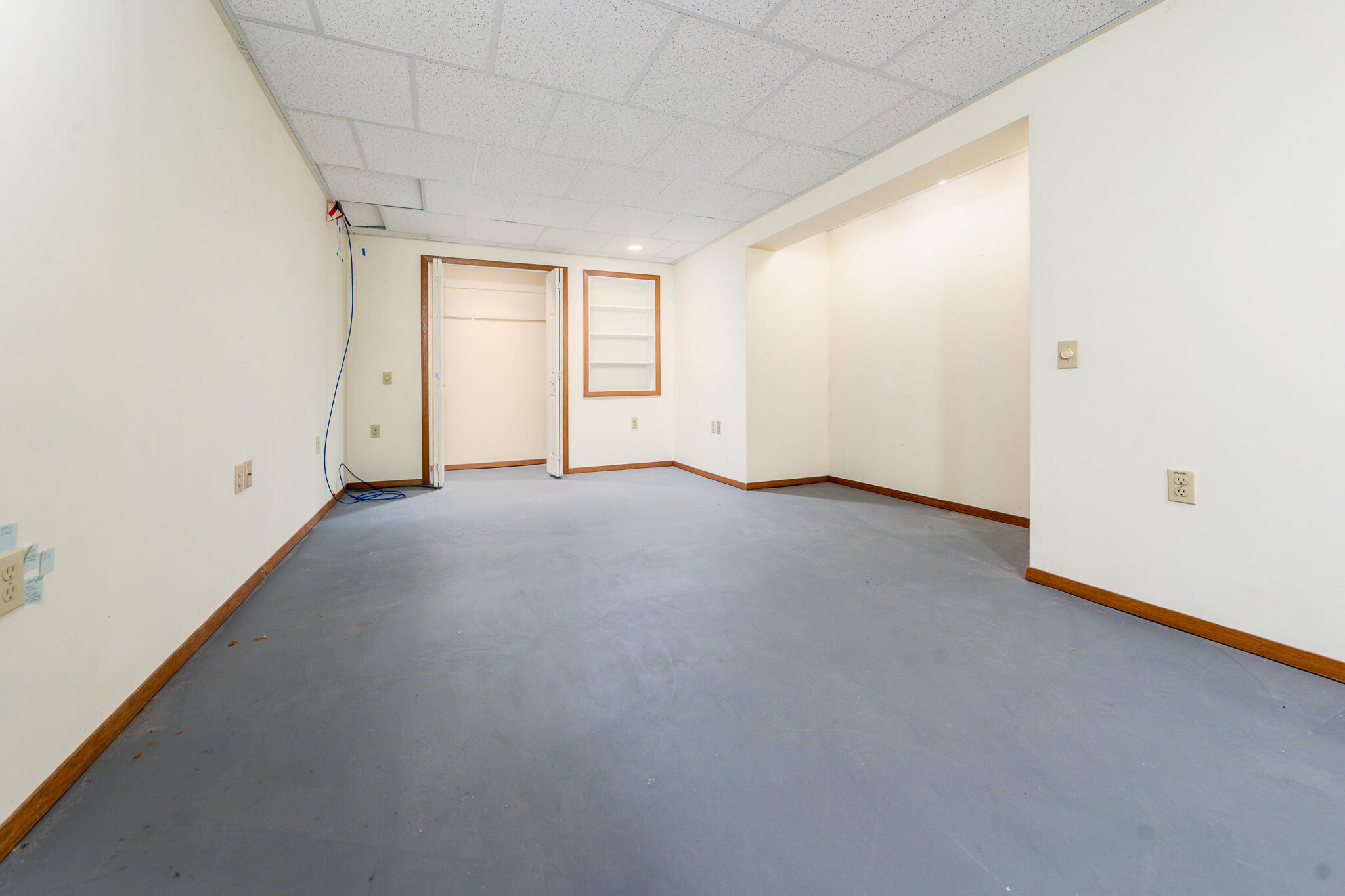 115 Sparrow Hawk Lane Eastham, MA 02642 - Photo 15 of 30 a view of an empty room and a window