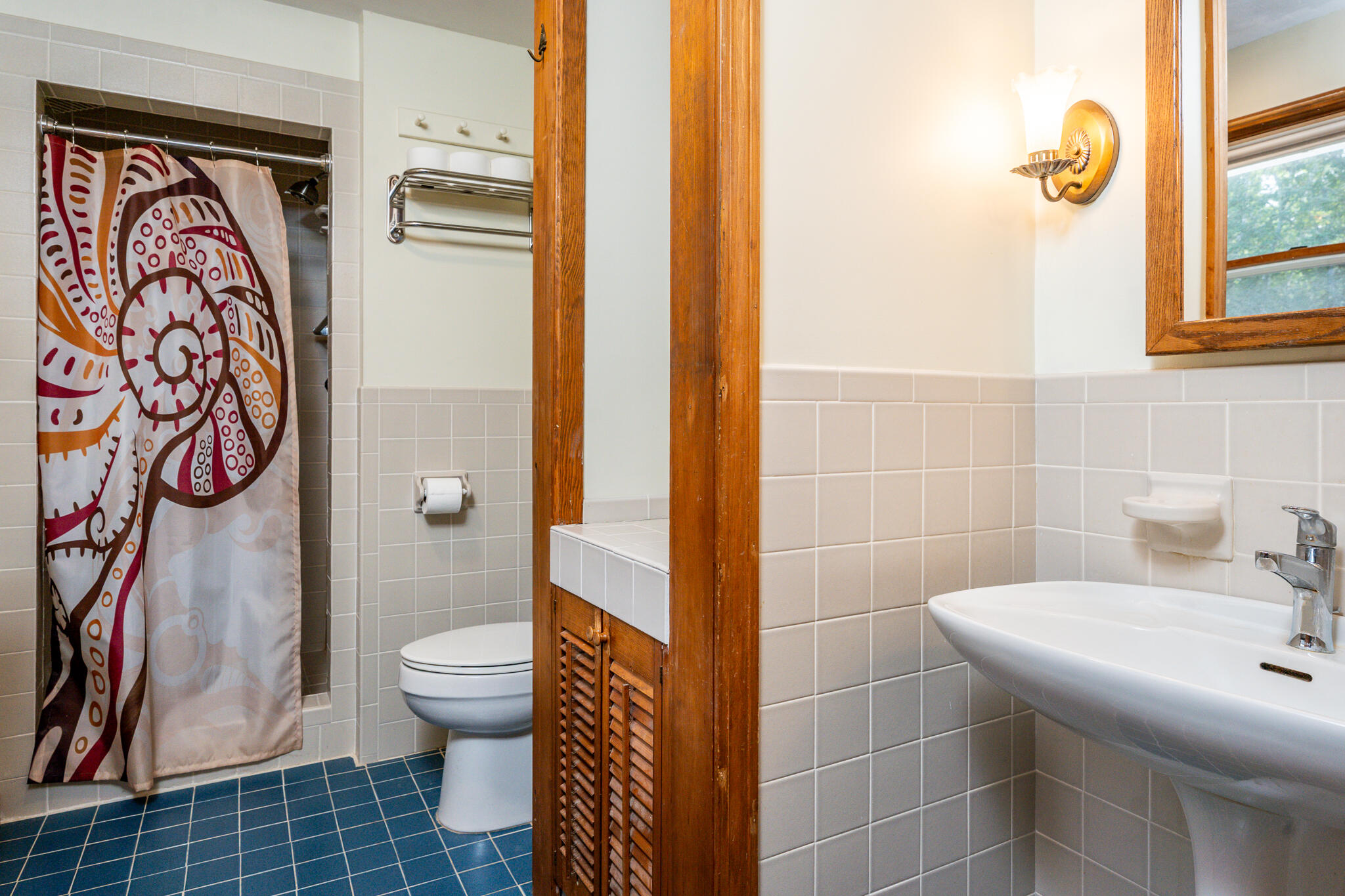 115 Sparrow Hawk Lane Eastham, MA 02642 - Photo 10 of 30 a bathroom with a sink toilet and shower