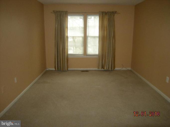 6947 Mayfair Terrace Laurel, MD 20707 - Photo 5 of 5 an empty room with windows