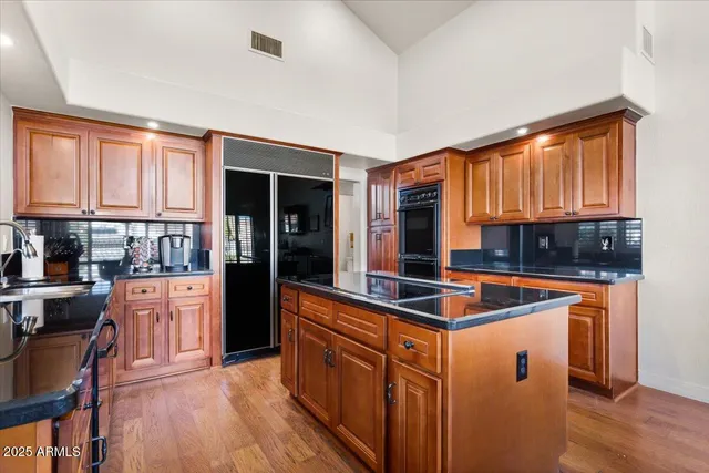 a workspace with furniture window and wooden floor