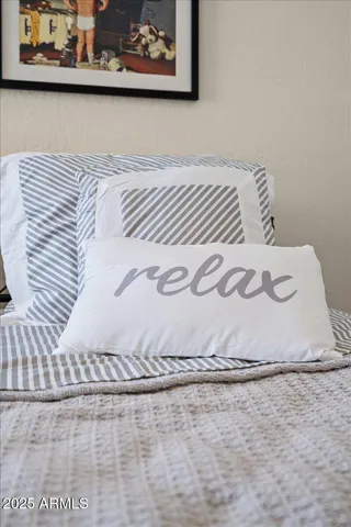 a patio with table and chairs