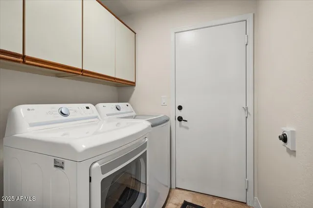 a view of a patio with couches and potted plants