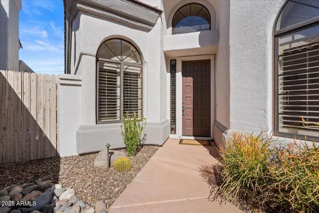 a front view of a house with patio