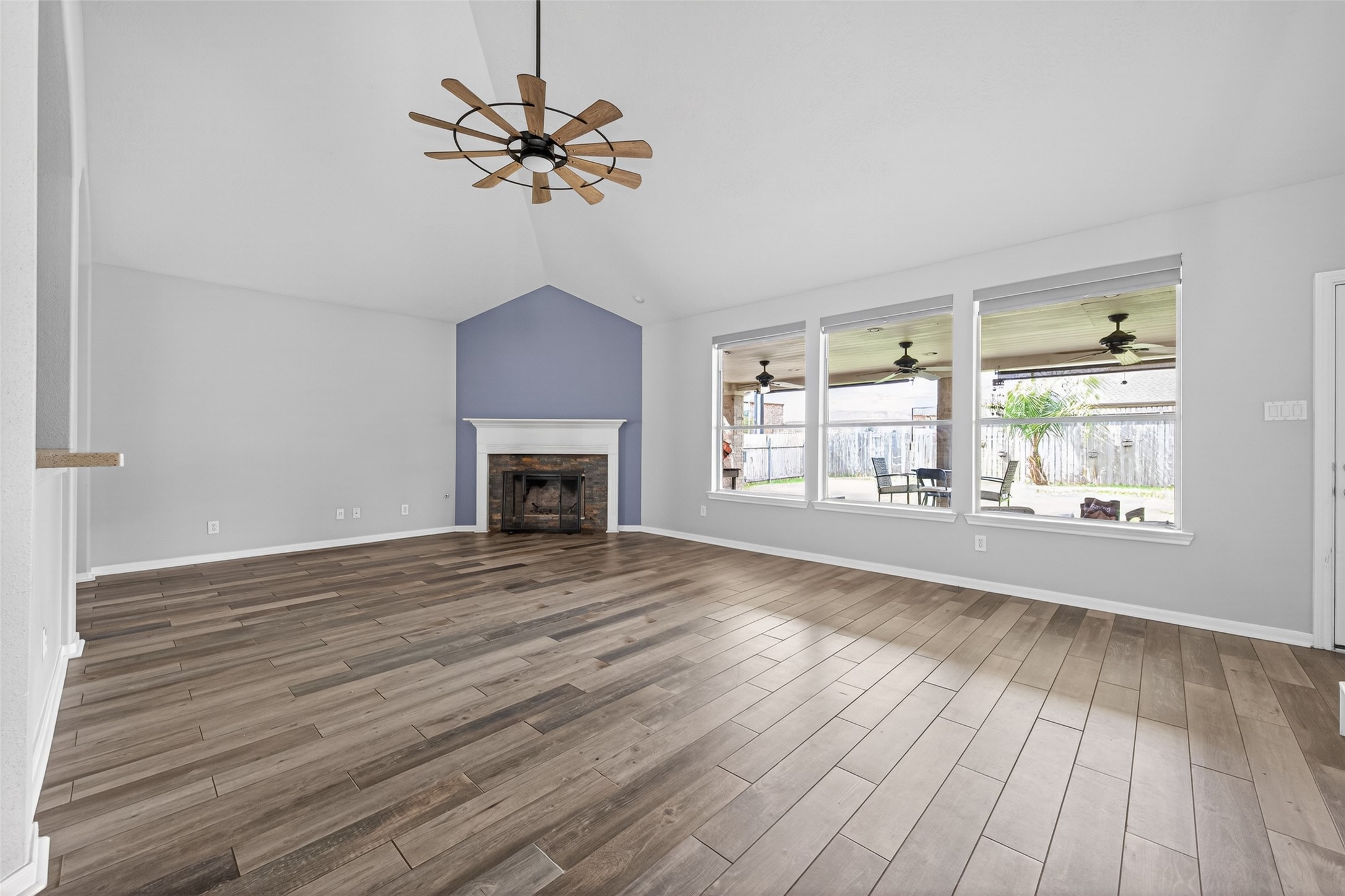 20827 Rose Crossing Lane Spring, TX 77379 - Photo 18 of 50 a view of an empty room with wooden floor and a window