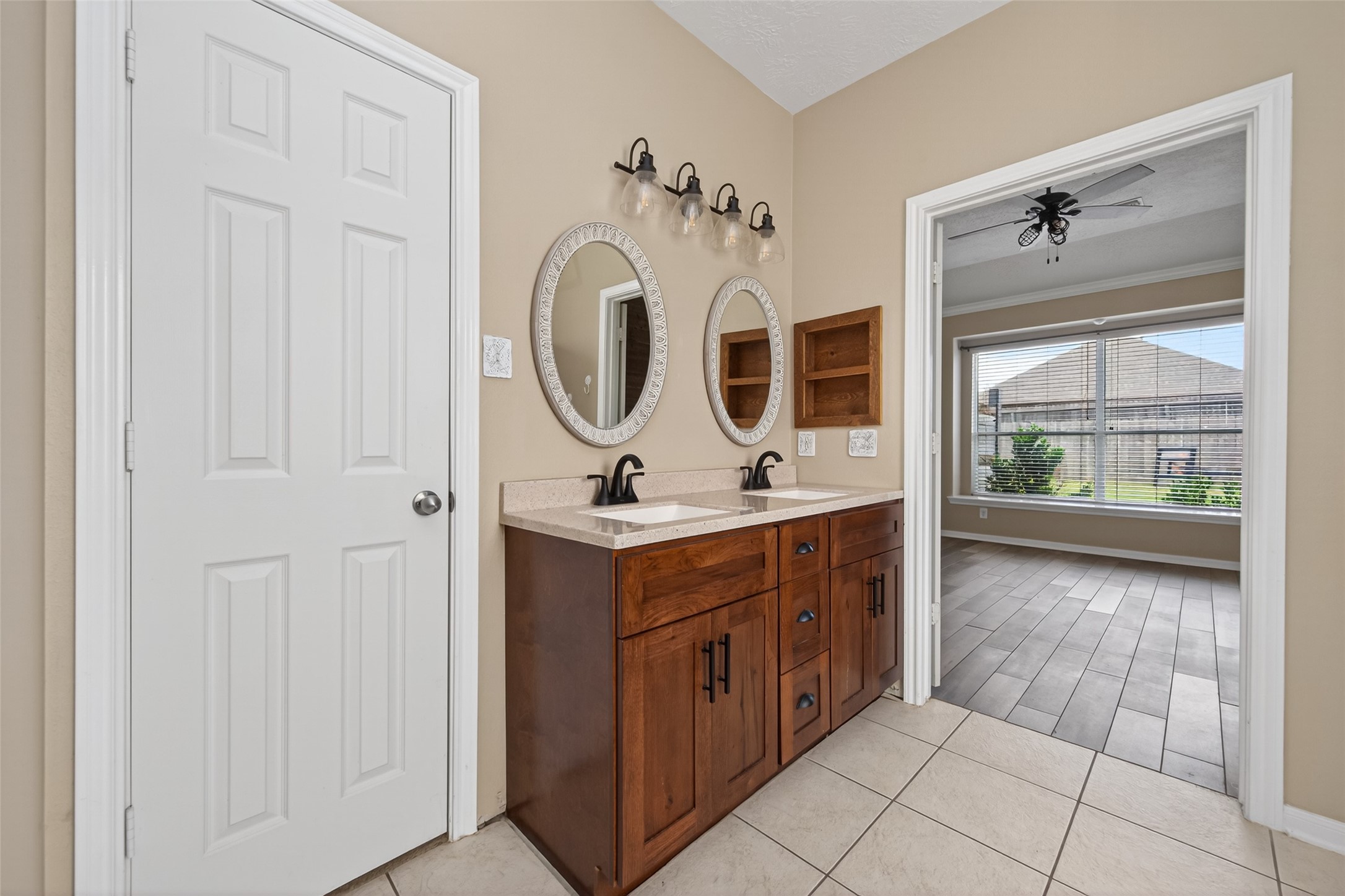 20827 Rose Crossing Lane Spring, TX 77379 - Photo 24 of 50 a bathroom with a sink a mirror and a shower