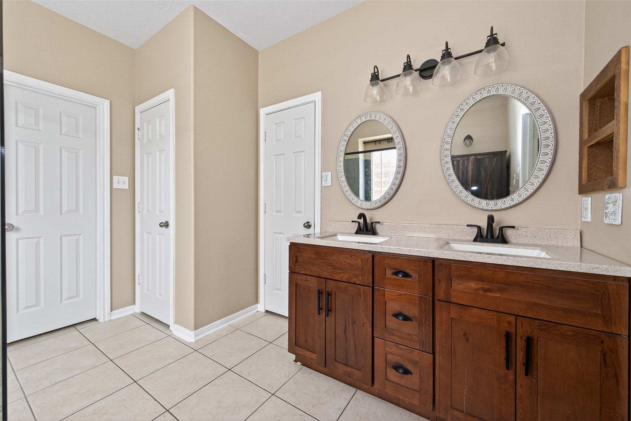 20827 Rose Crossing Lane Spring, TX 77379 - Photo 25 of 50 a bathroom with a double vanity sink and a mirror