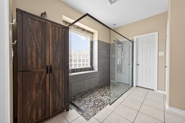 a view of a room with racks on the wall