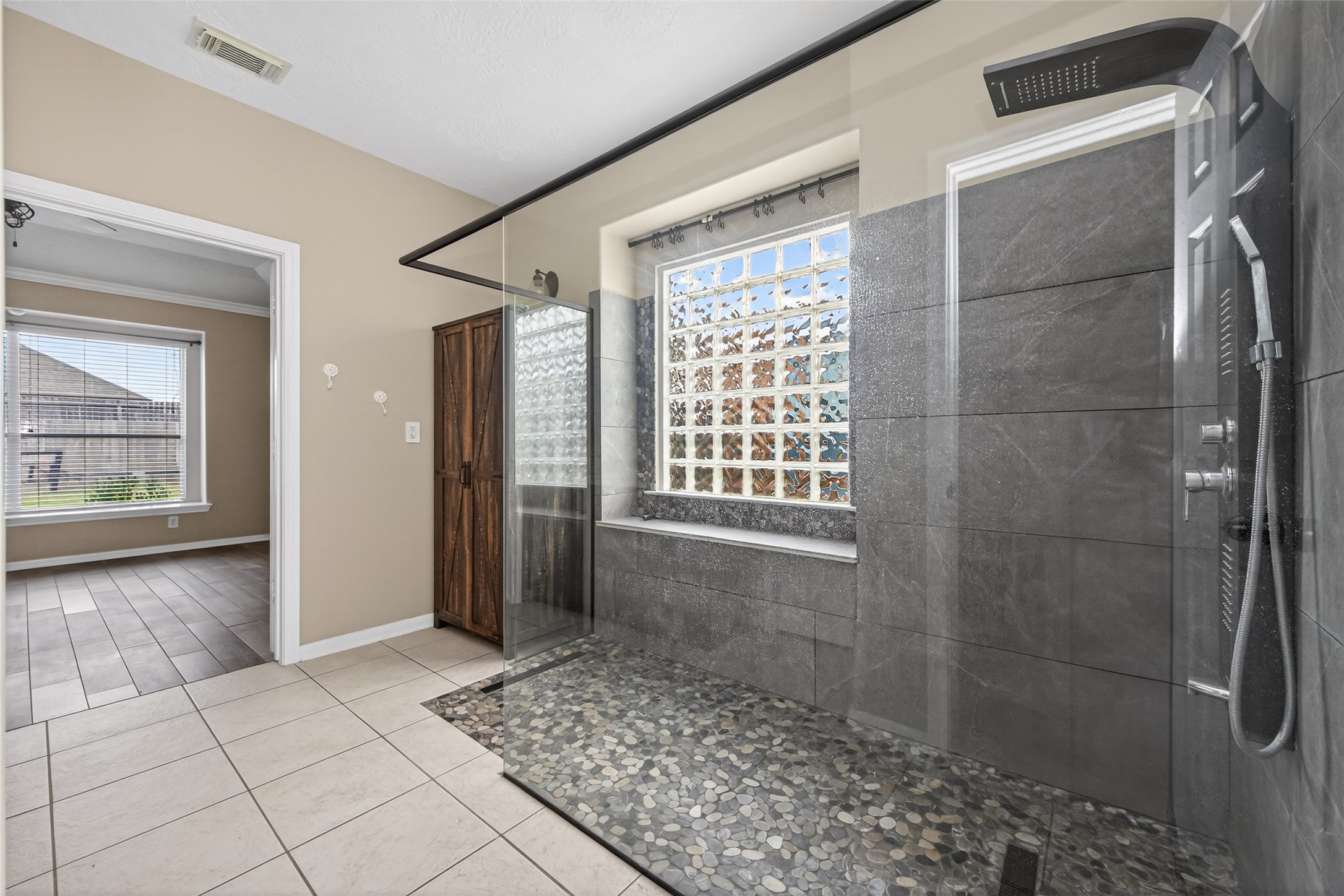 20827 Rose Crossing Lane Spring, TX 77379 - Photo 27 of 50 Huge shower with a cabinet in the picture.