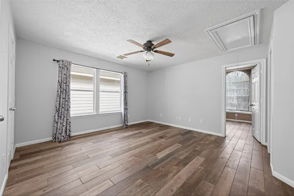 a bathroom with a toilet a sink and a bathtub