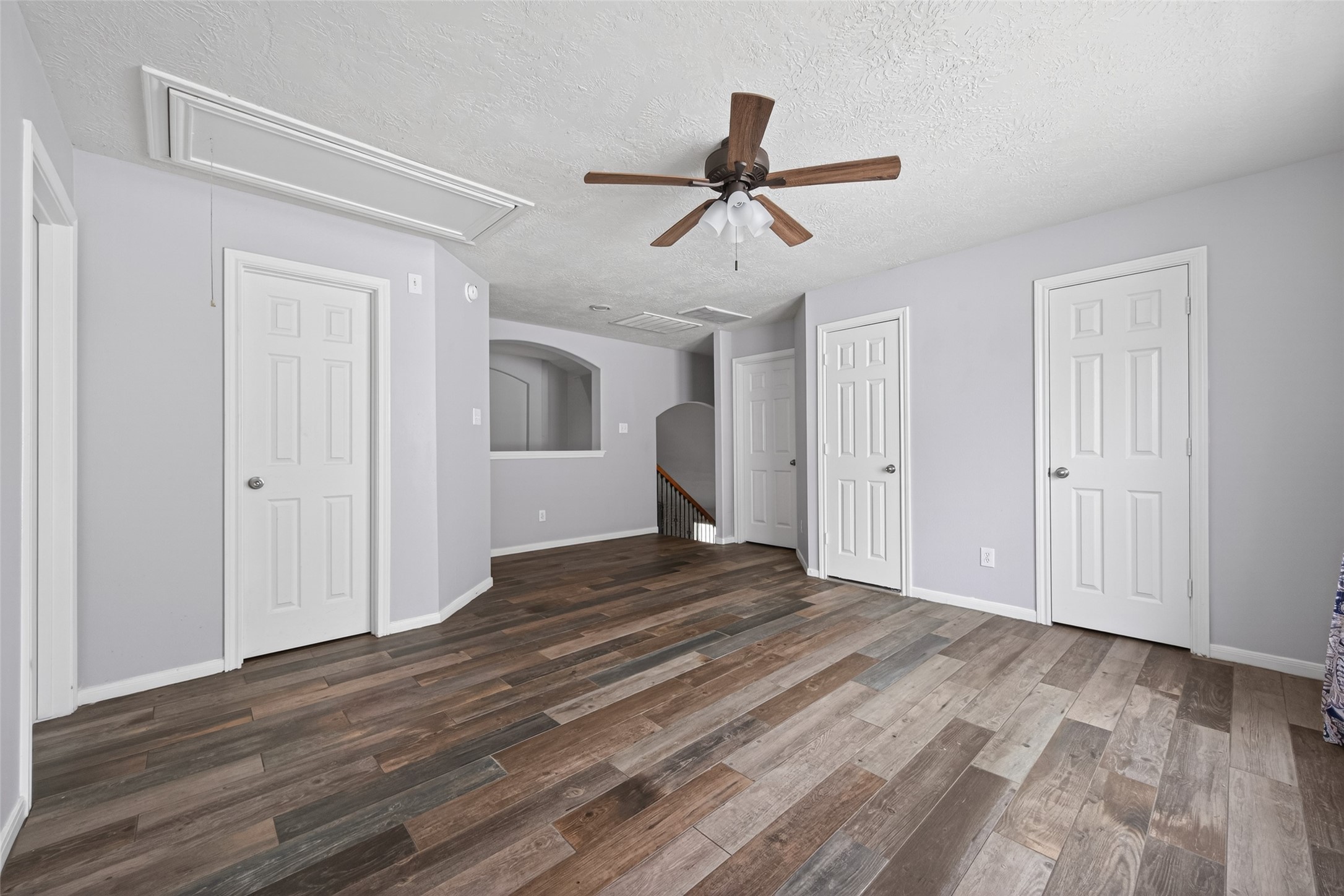 20827 Rose Crossing Lane Spring, TX 77379 - Photo 36 of 50 a view of empty room with wooden floor and fan