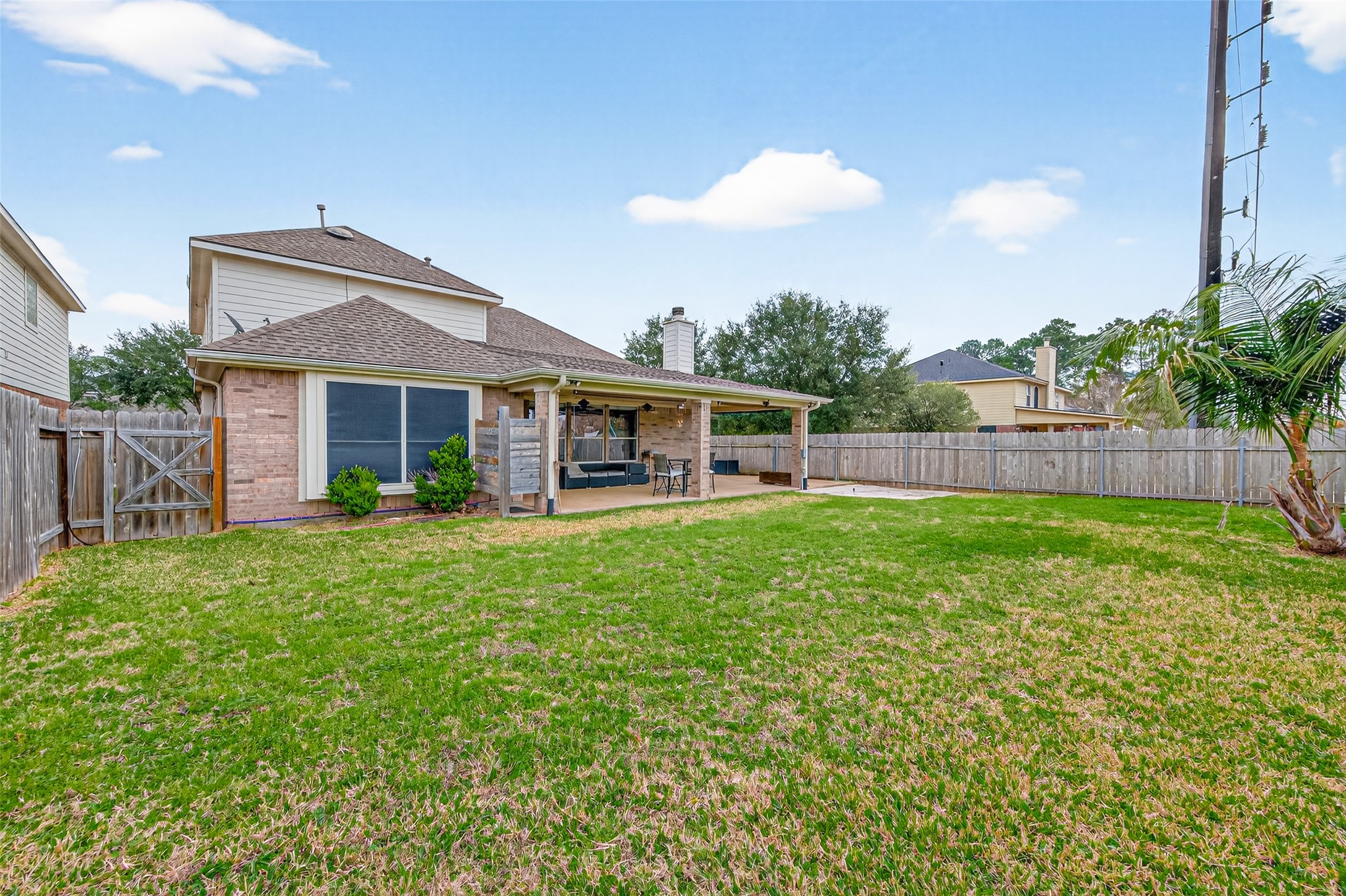 20827 Rose Crossing Lane Spring, TX 77379 - Photo 46 of 50 a view of a house with a backyard