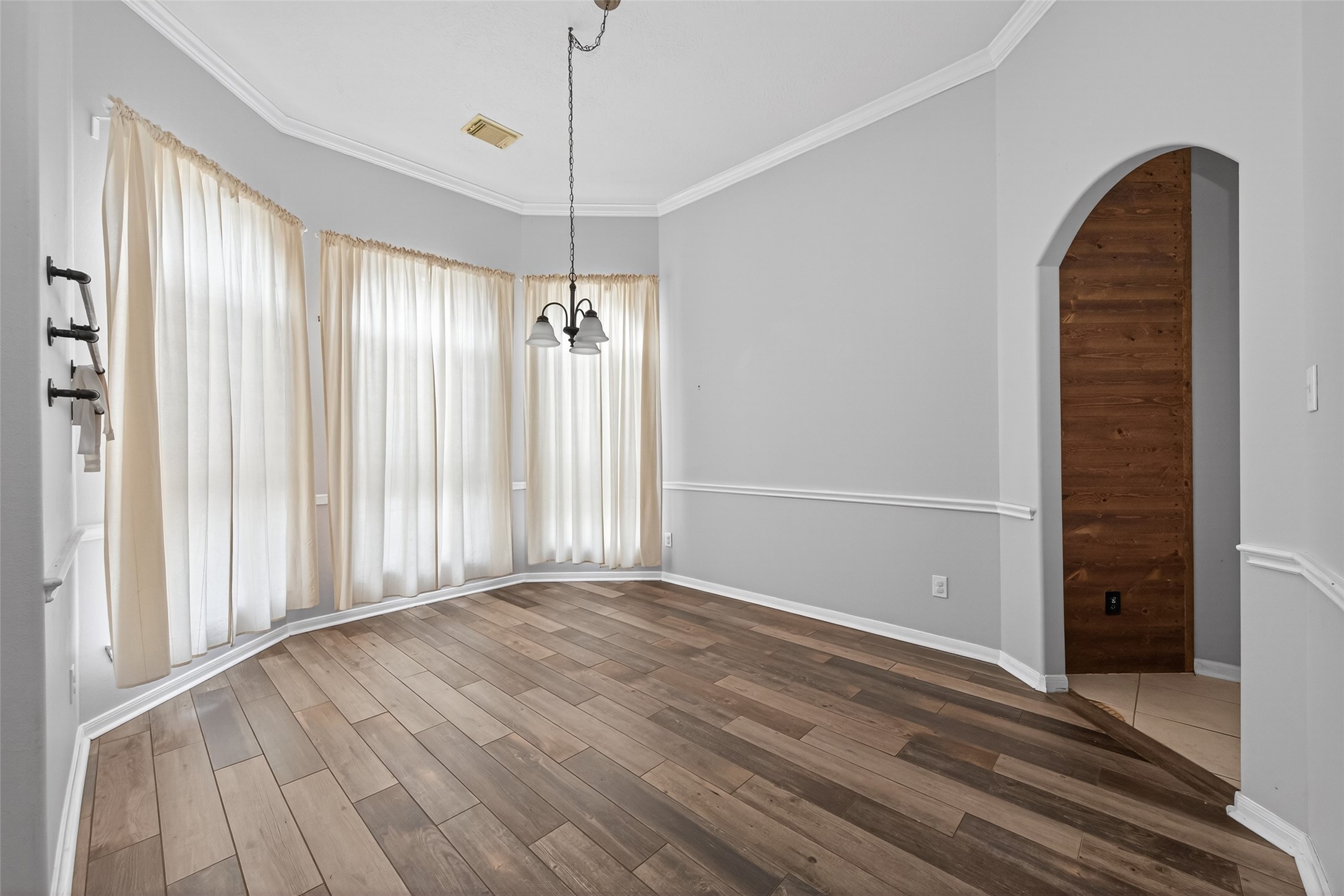 20827 Rose Crossing Lane Spring, TX 77379 - Photo 5 of 50 a view of a livingroom with wooden floor and a ceiling fan