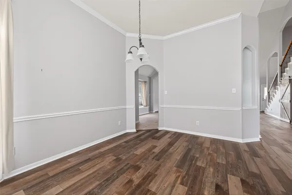 a view of a livingroom with a fireplace and large window