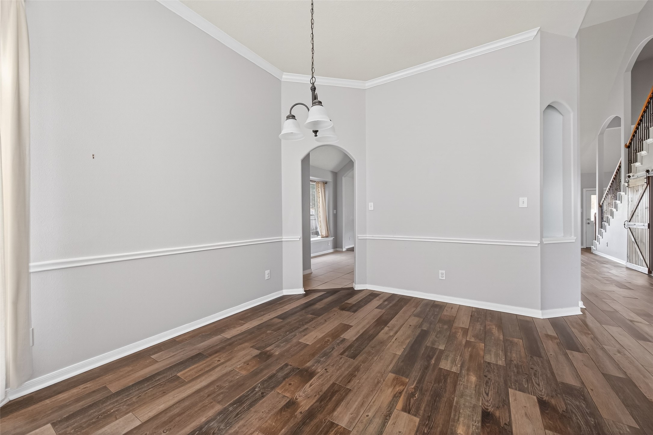 20827 Rose Crossing Lane Spring, TX 77379 - Photo 8 of 50 a view of livingroom with hardwood floor and window