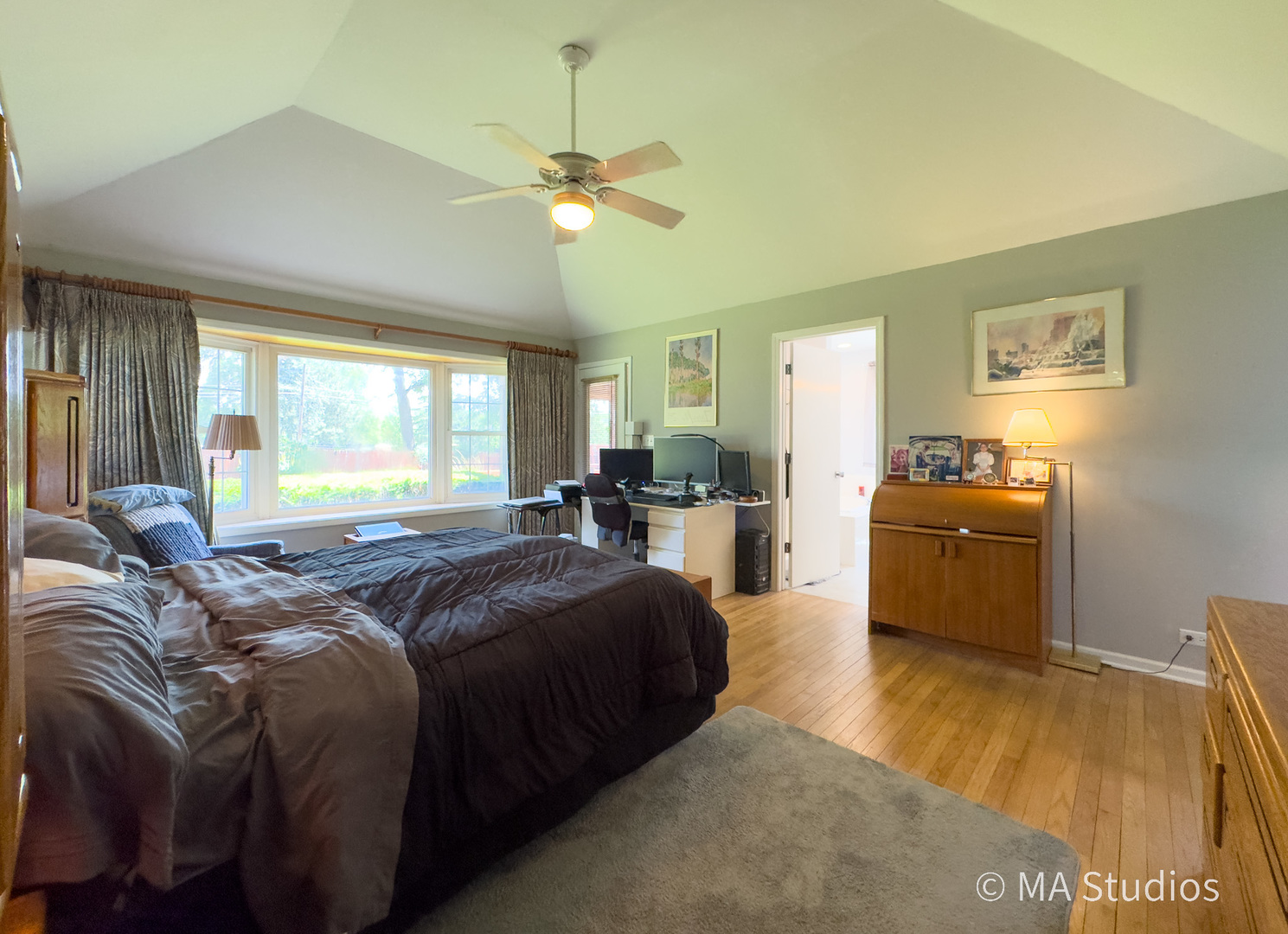 1219 Golf Lane Wheaton, IL 60189 - Photo 13 of 67 a spacious bedroom with a bed and wooden floor