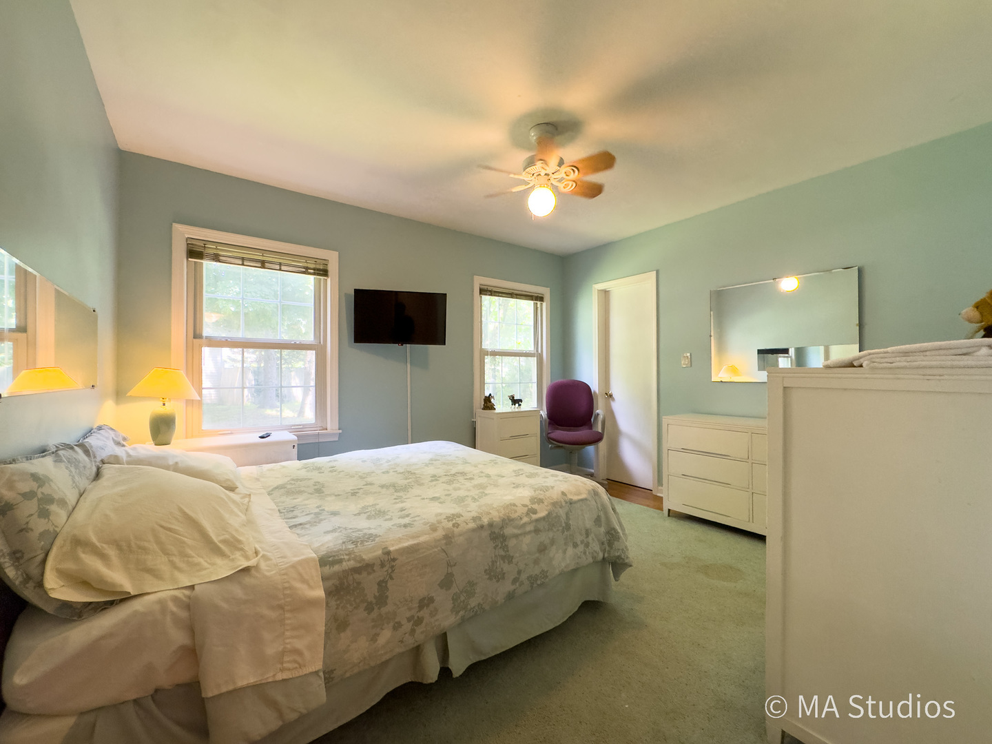1219 Golf Lane Wheaton, IL 60189 - Photo 23 of 67 a spacious bedroom with a bed and a chandelier