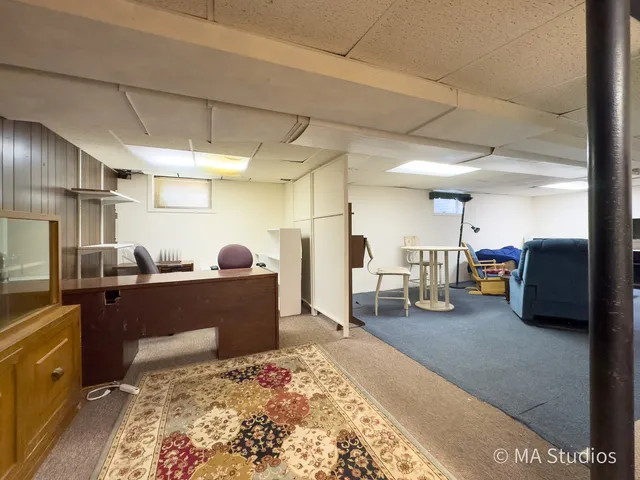 a living room with furniture and a couch