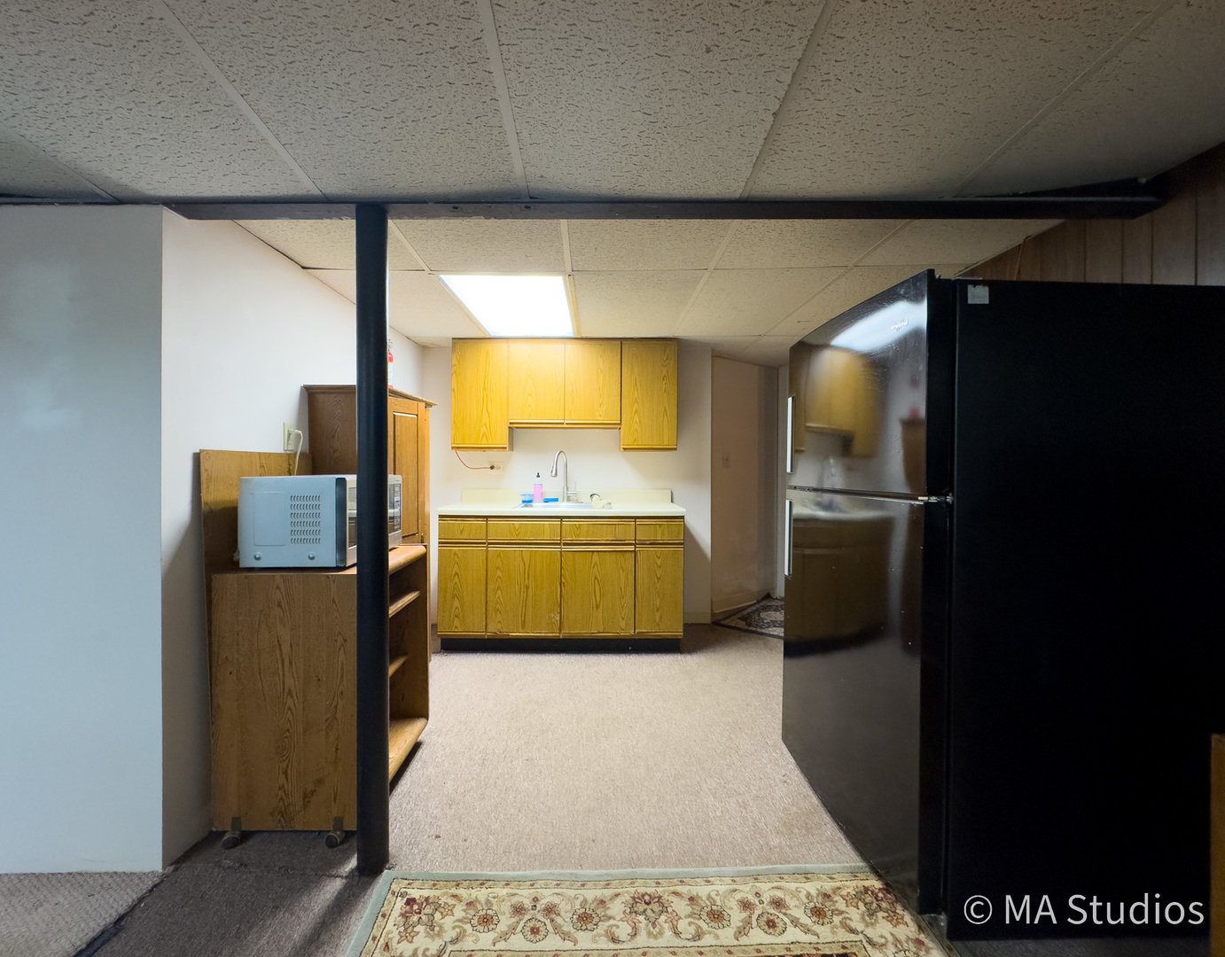 1219 Golf Lane Wheaton, IL 60189 - Photo 32 of 67 a kitchen with stainless steel appliances a refrigerator and a sink
