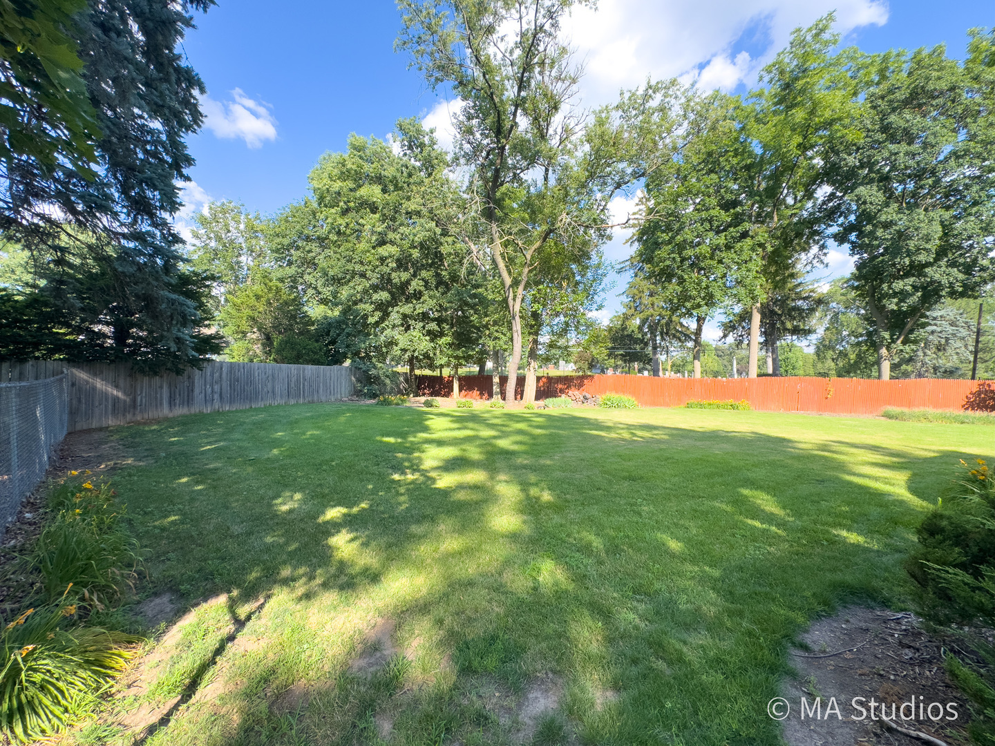 1219 Golf Lane Wheaton, IL 60189 - Photo 50 of 67 a view of green field with trees in the background