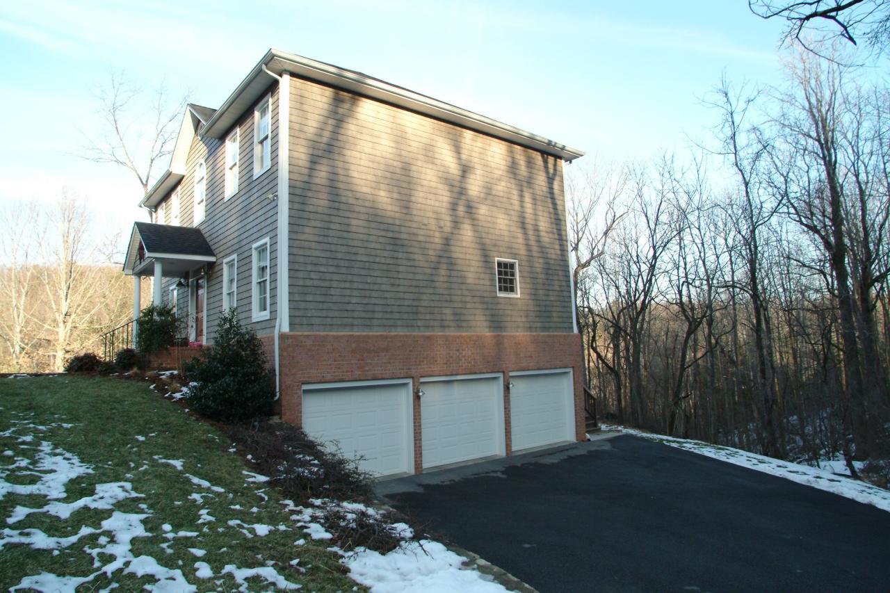 5780 Lost Mountain Road Roanoke, VA 24018 - Photo 2 of 16 a house view with a backyard space