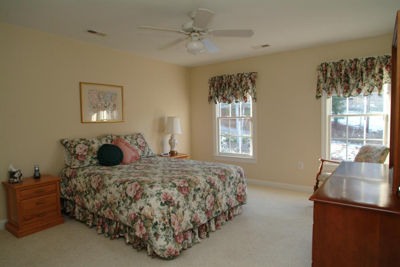 5780 Lost Mountain Road Roanoke, VA 24018 - Photo 11 of 16 a bedroom with a bed and window