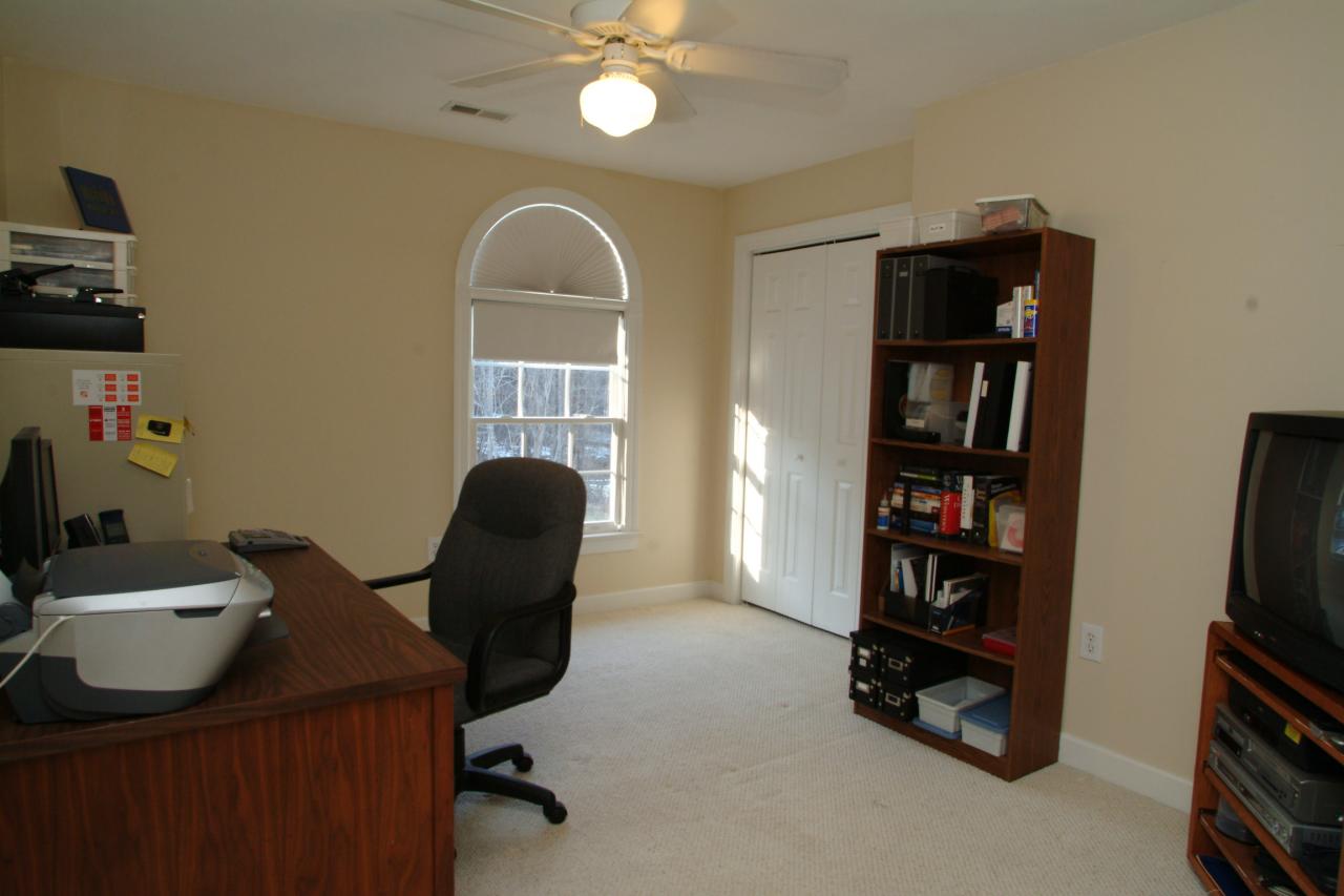 5780 Lost Mountain Road Roanoke, VA 24018 - Photo 12 of 16 a view of a workspace with furniture and a window