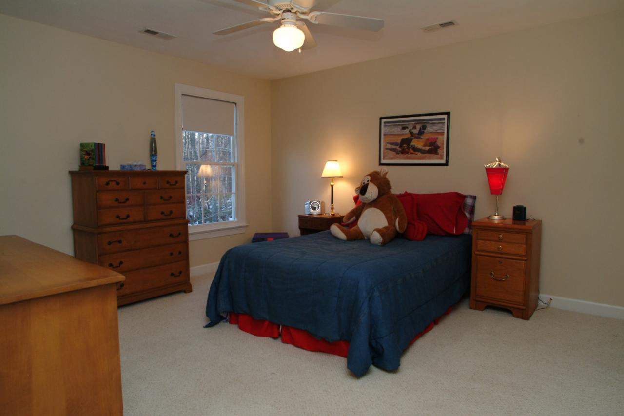 5780 Lost Mountain Road Roanoke, VA 24018 - Photo 13 of 16 a bed room with a bed and a dresser