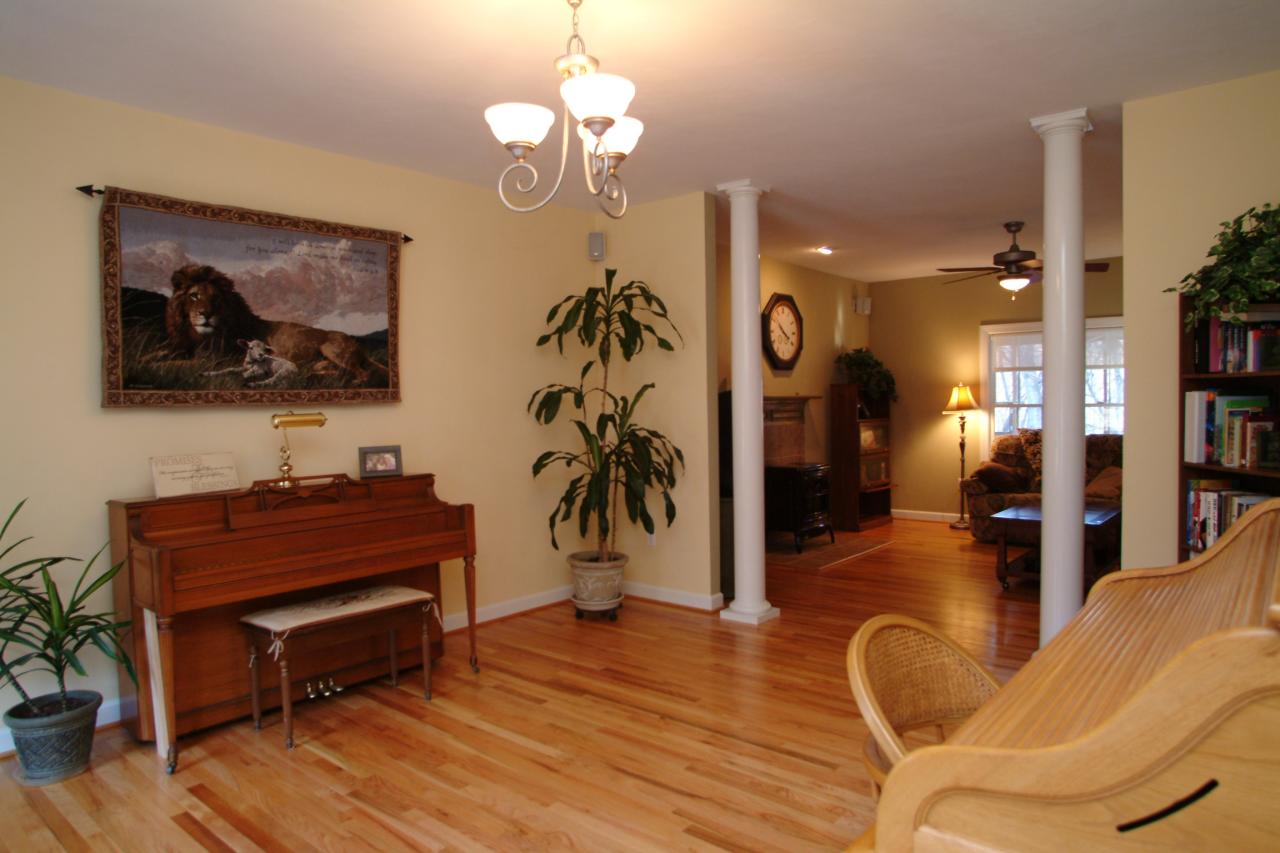 5780 Lost Mountain Road Roanoke, VA 24018 - Photo 3 of 16 a living room with furniture and a chandelier