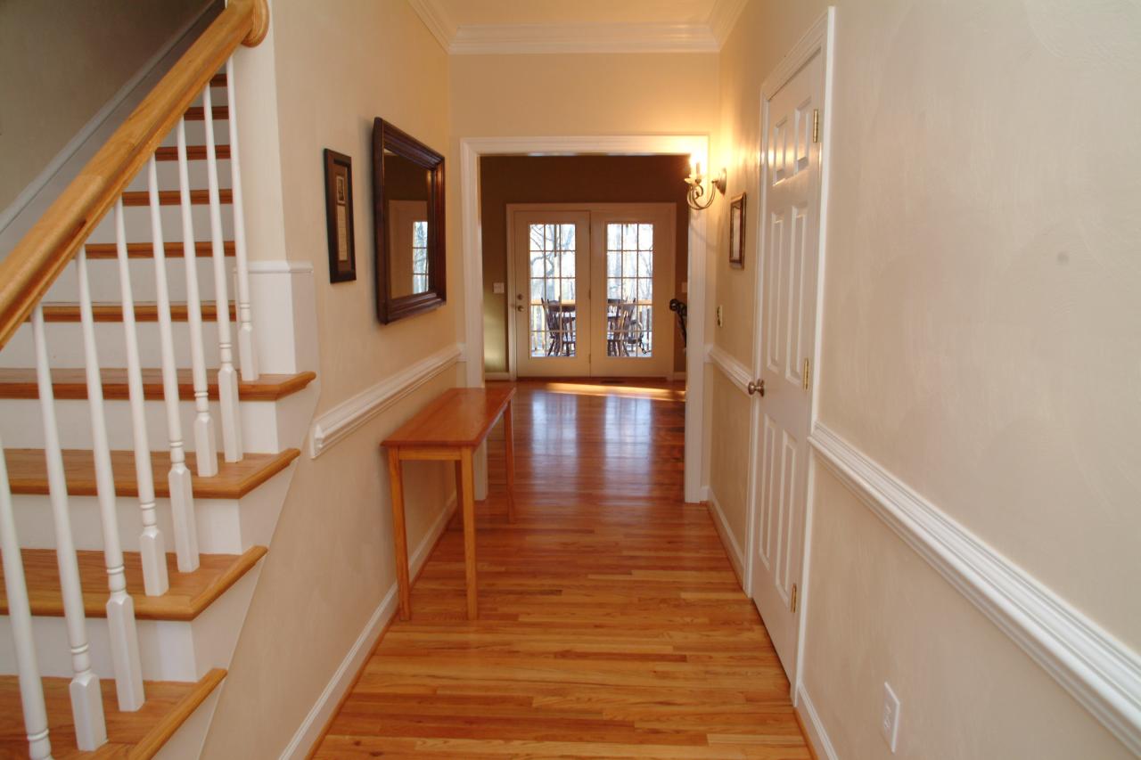 5780 Lost Mountain Road Roanoke, VA 24018 - Photo 8 of 16 a view of a hallway with wooden floor and staircase