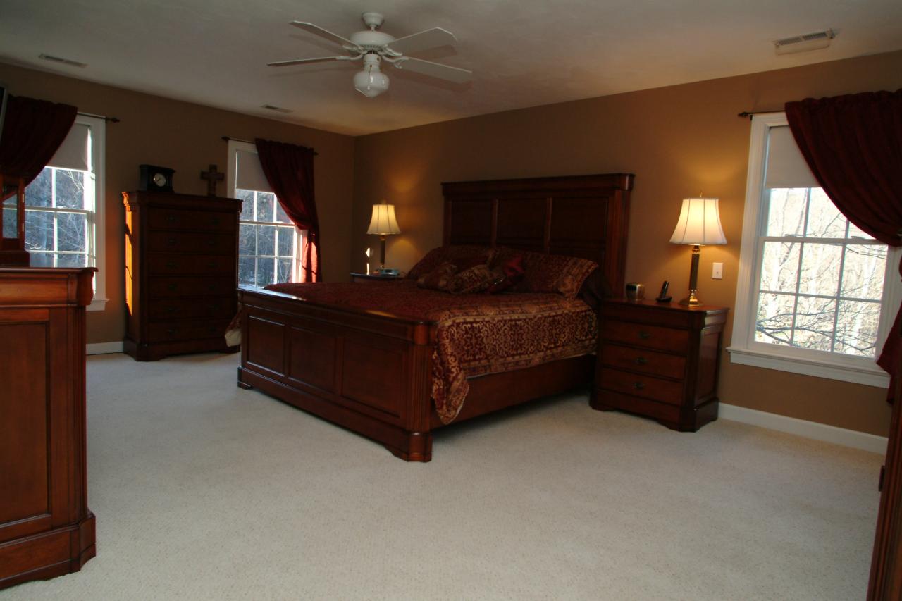 5780 Lost Mountain Road Roanoke, VA 24018 - Photo 9 of 16 a spacious bedroom with a bed window and a television