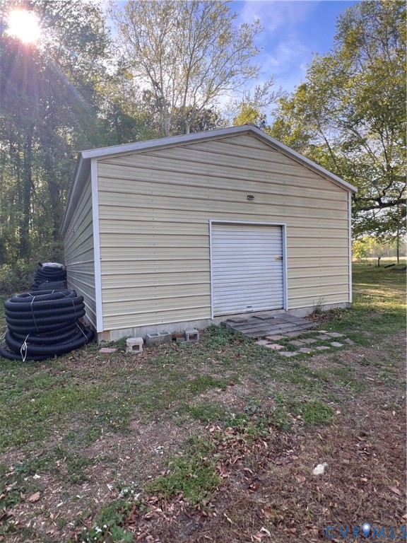 36210 Owens Grove Road Waverly, VA 23890 - Photo 9 of 24 a view of a small house and yard