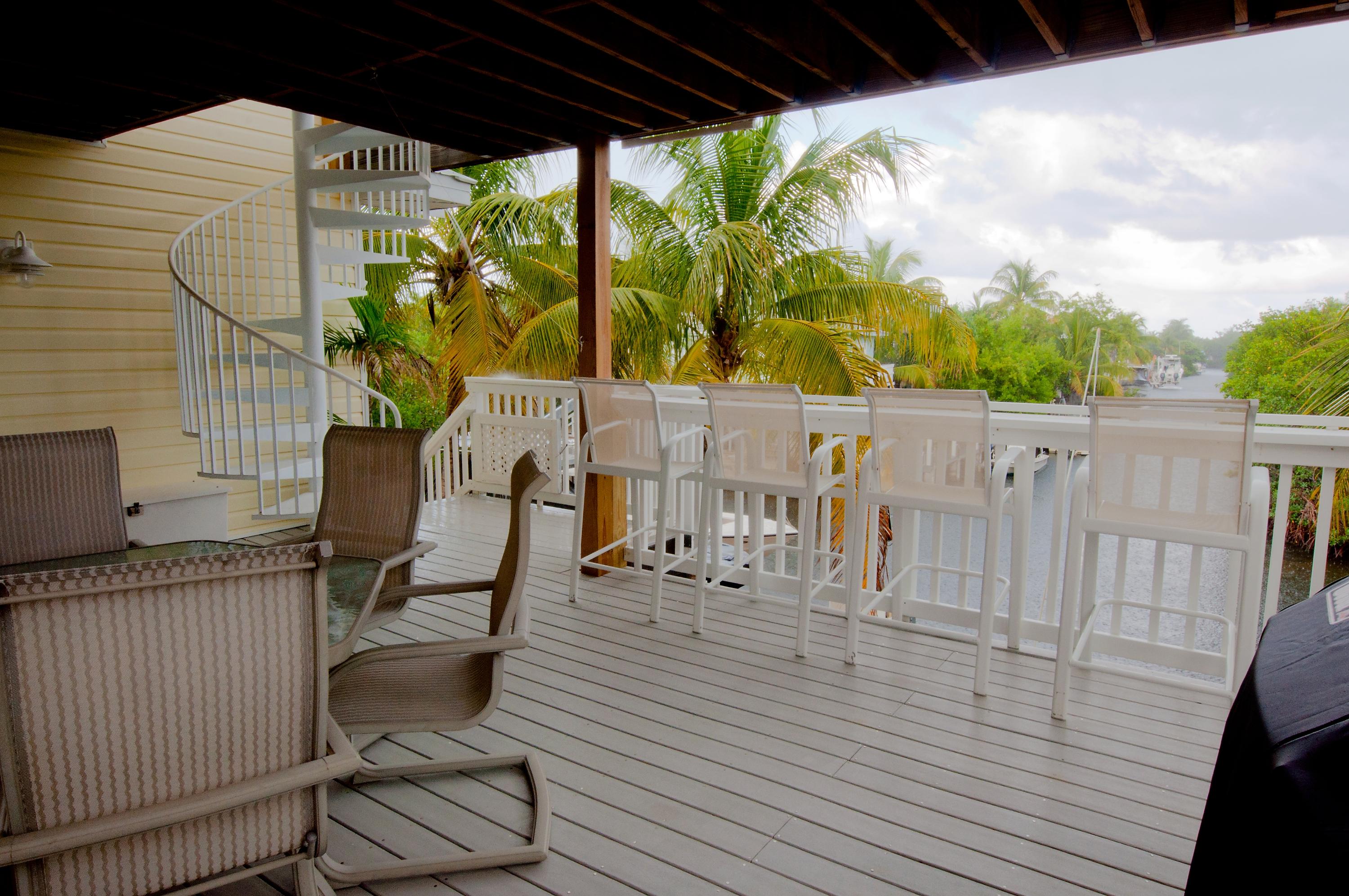 763 Indies Road Summerland Key, FL 33042 - Photo 30 of 43 Porch_view_canal_Bartels+763+I-282383926
