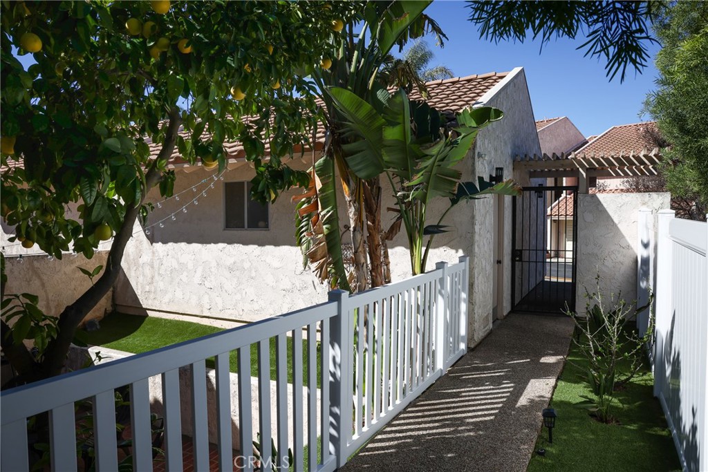 2216 El Capitan Drive Riverside, CA 92506 - Photo 26 of 39 a view of a house with a small yard