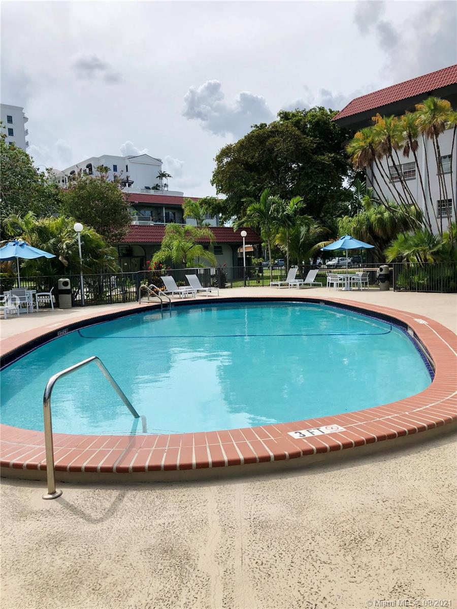 Granada Dadeland Condominiums Miami, FL 33143 - Photo 8 of 30 a view of swimming pool from a balcony