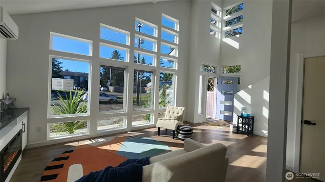 a view of a livingroom with furniture and window