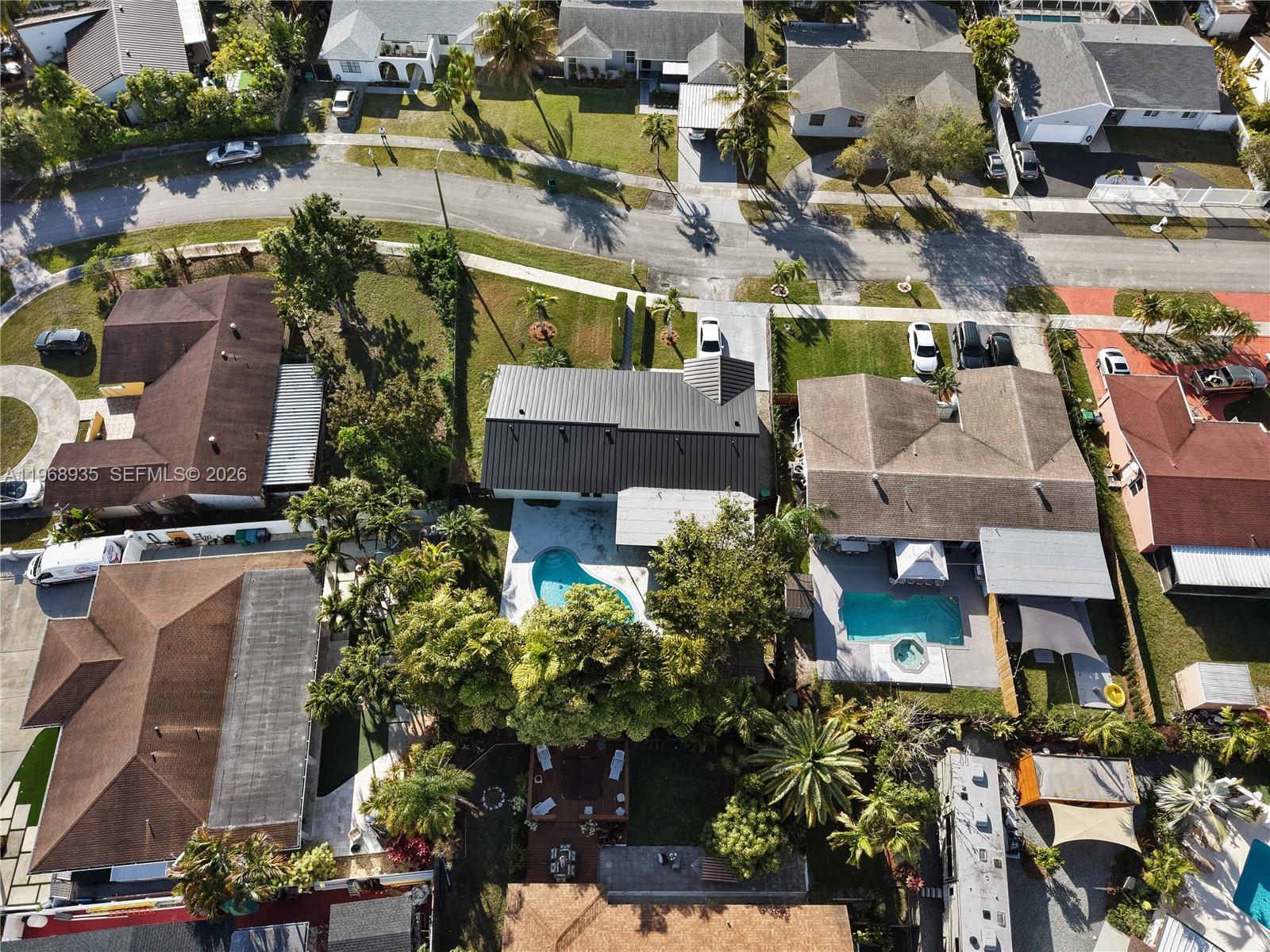 16323 Southwest 103rd Place Miami, FL 33157 - Photo 42 of 42 an aerial view of a houses with yard