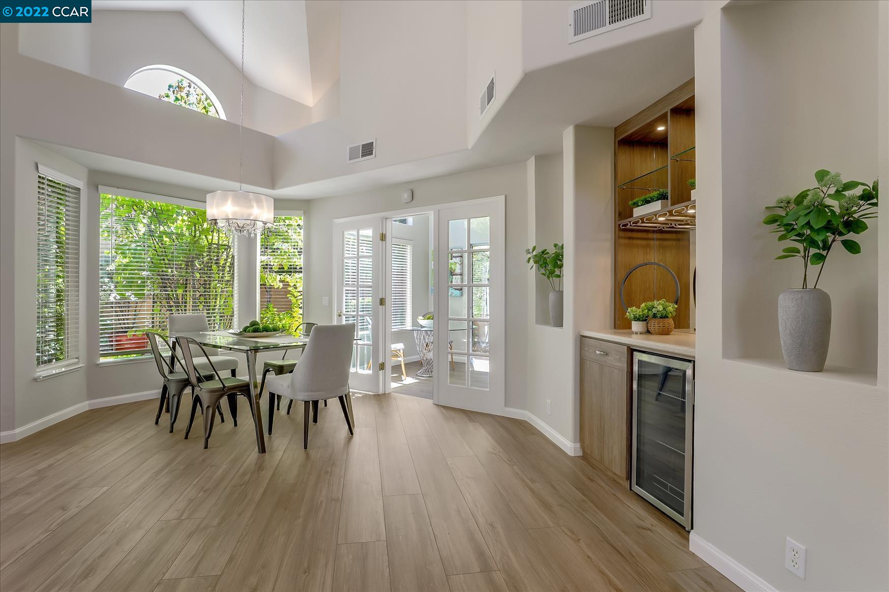 388 Catalan Way San Ramon, CA 94582 - Photo 20 of 52 a view of a dining room with furniture window and wooden floor