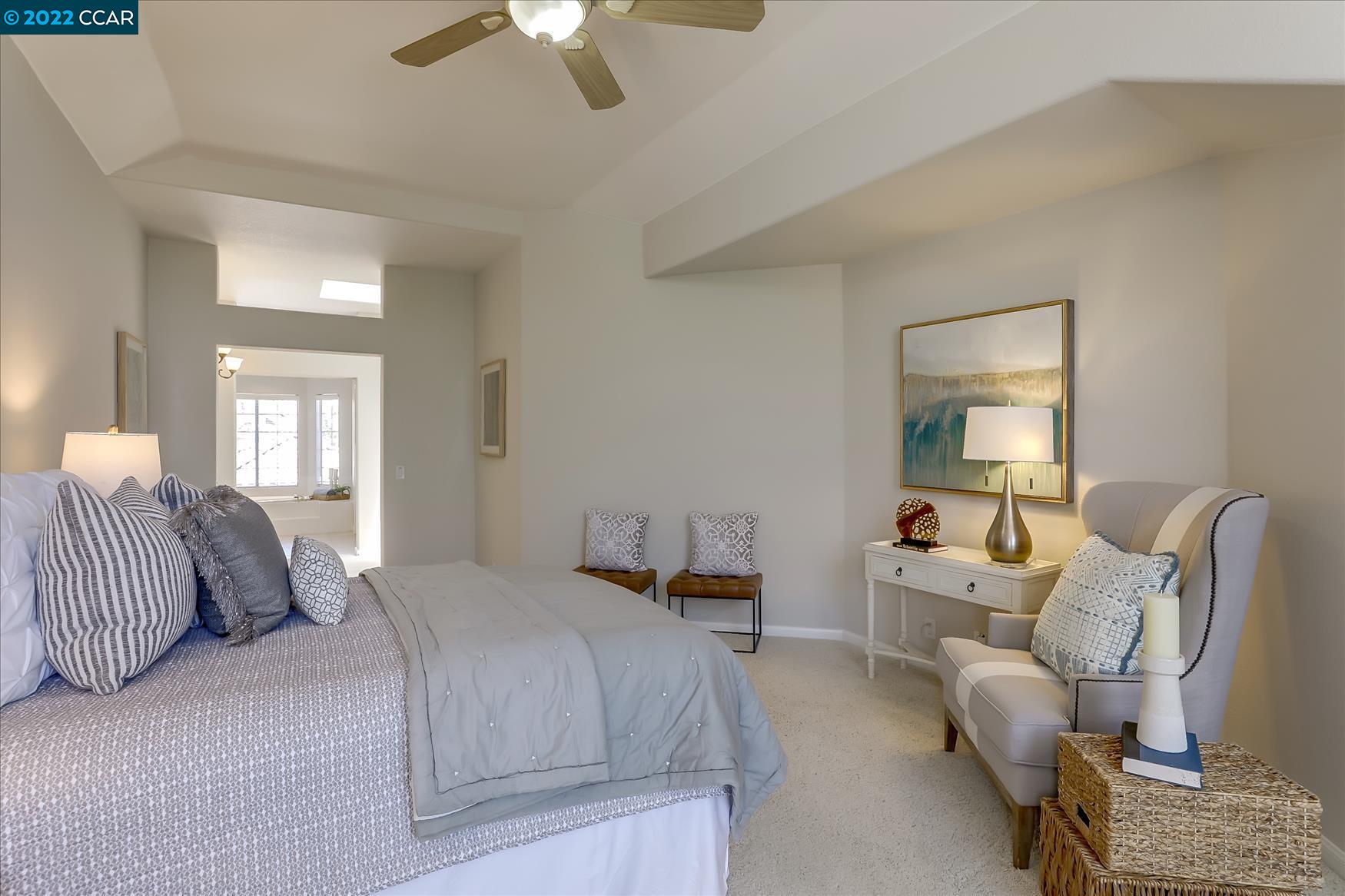 388 Catalan Way San Ramon, CA 94582 - Photo 27 of 52 a bedroom with a bed and furniture