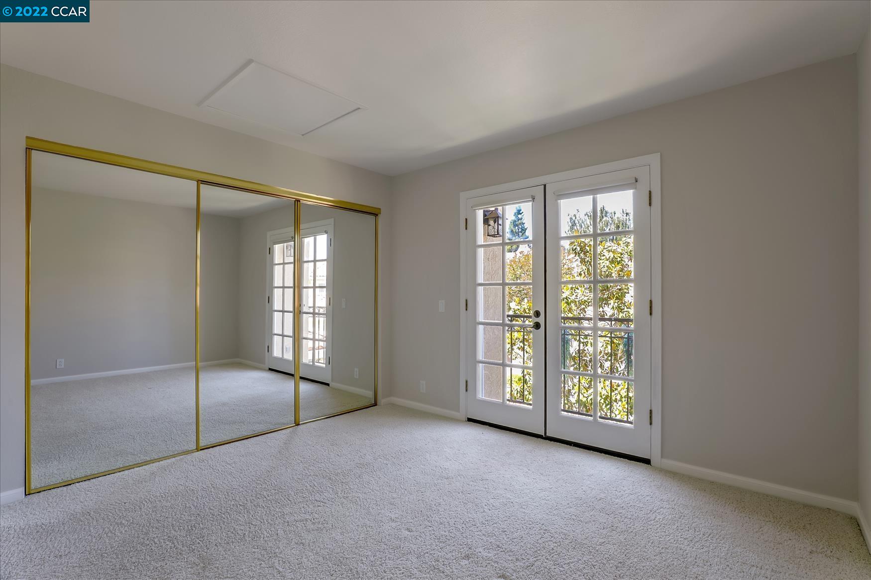 388 Catalan Way San Ramon, CA 94582 - Photo 30 of 52 an empty room with windows and balcony