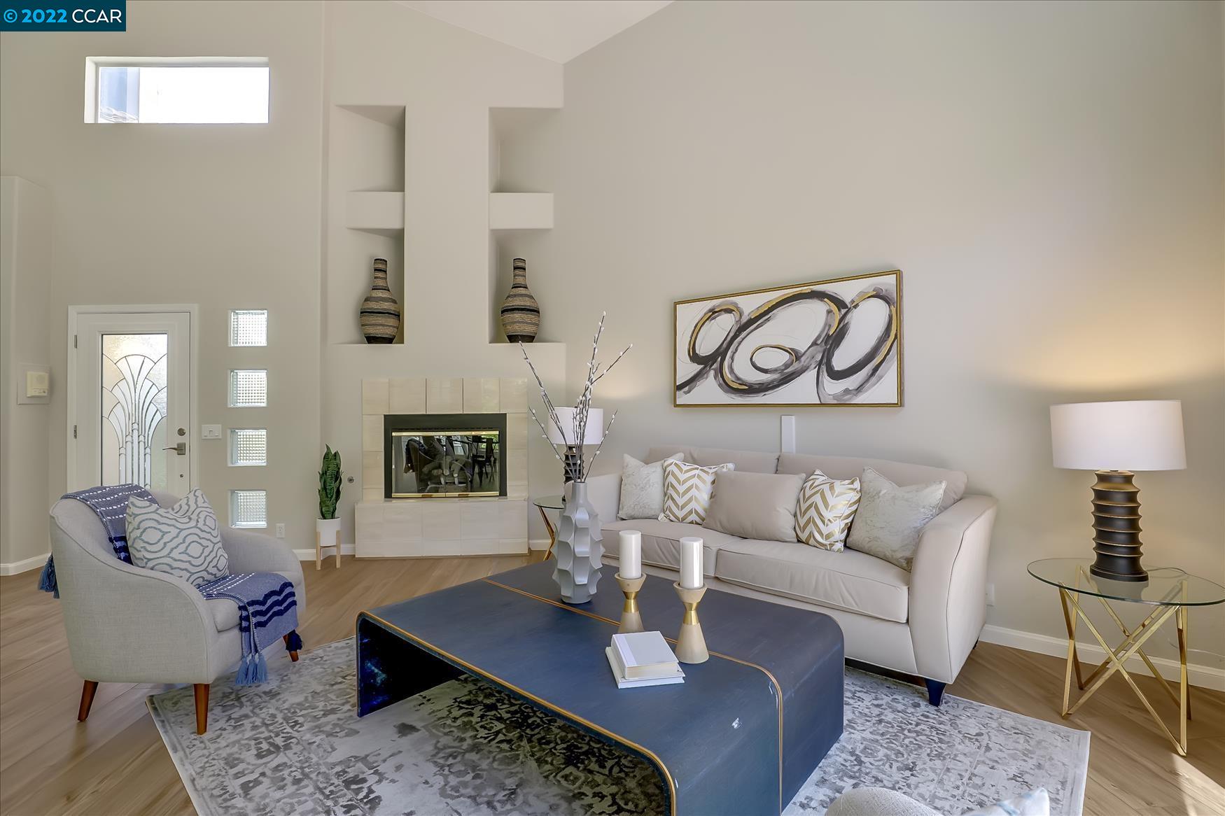 388 Catalan Way San Ramon, CA 94582 - Photo 4 of 52 a living room with furniture a rug and a table