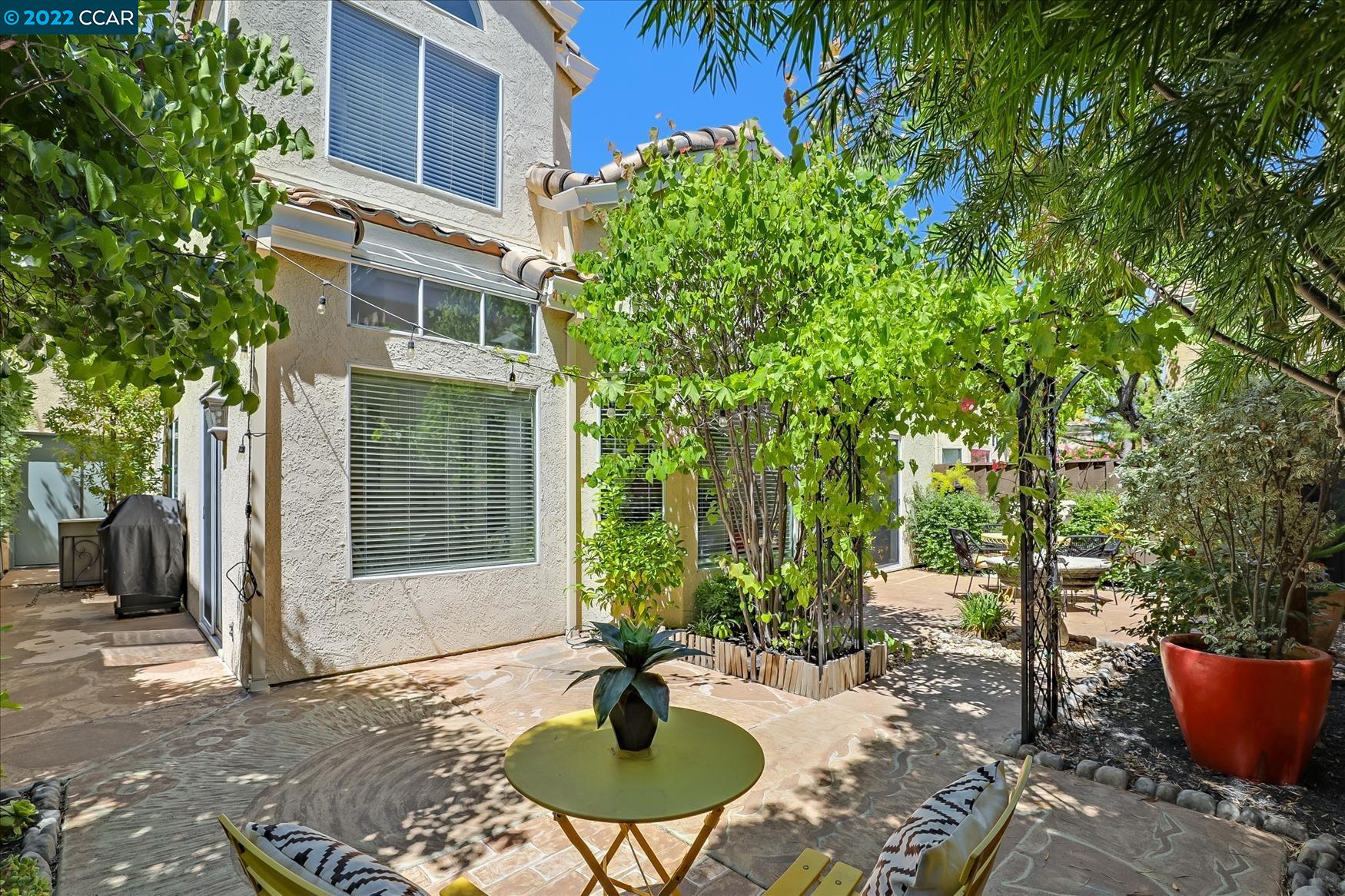 388 Catalan Way San Ramon, CA 94582 - Photo 42 of 52 a backyard of a house with table and chairs
